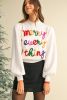 White Colorful Tinsel Merry Every Thing Graphic Mock Neck Sweater