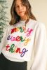 White Colorful Tinsel Merry Every Thing Graphic Mock Neck Sweater