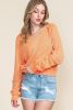 Orange Waffle Knit Exposed Seam Long Sleeve Top